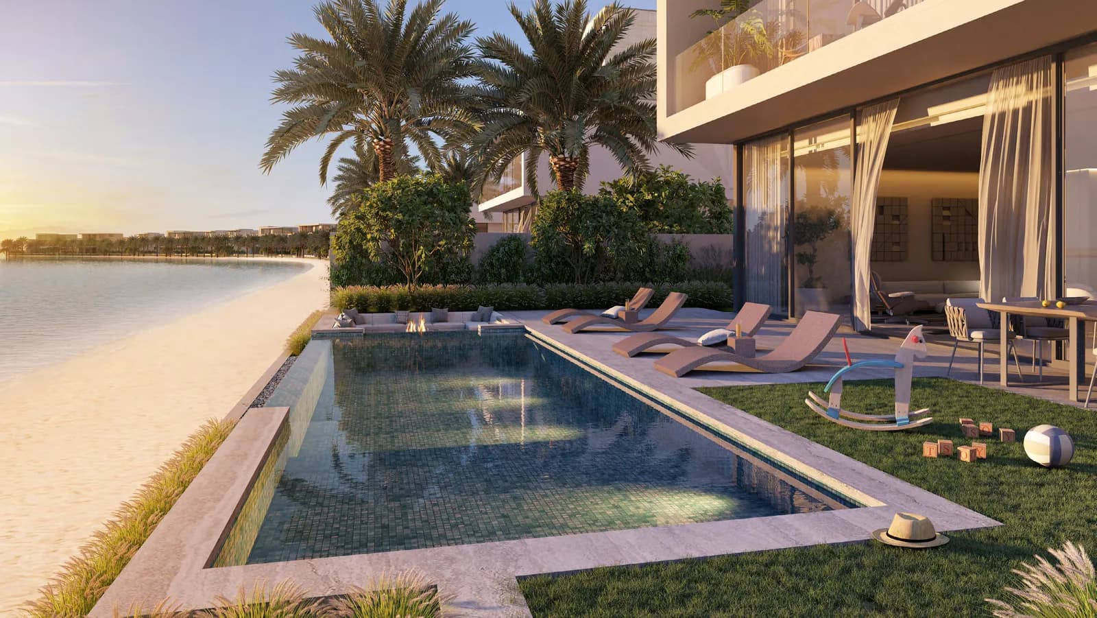 Private pool terrace opening onto the sand at a Palm Jebel Ali villa